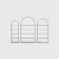 Arched bookcase Arkada, available in Switzerland through ÉTAUDORÉ, made from highest quality powdered coated steel in cold beige