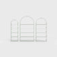 Arched bookcase Arkada, available in Switzerland through ÉTAUDORÉ, made from highest quality powdered coated steel in light matcha green color