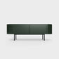 Curved Desiva Enna 01 lowboard in bottle green color steel, available in Switzerland via ÉTAUDORÉ
