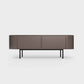 Curved Desiva Enna 01 lowboard in earth brown color steel, available in Switzerland via ÉTAUDORÉ