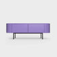 Curved Desiva Enna 01 lowboard in iris violet color steel, available in Switzerland via ÉTAUDORÉ