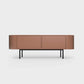 Curved Desiva Enna 01 lowboard in terracotta color steel, available in Switzerland via ÉTAUDORÉ