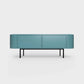 Curved Desiva Enna 01 lowboard in turquoise blue-green color steel, available in Switzerland via ÉTAUDORÉ