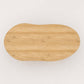 Top view of the tabletop of the ÉTAUDORÉ & Our Wabi Sabi Home Agata organic shape table in solid oak wood