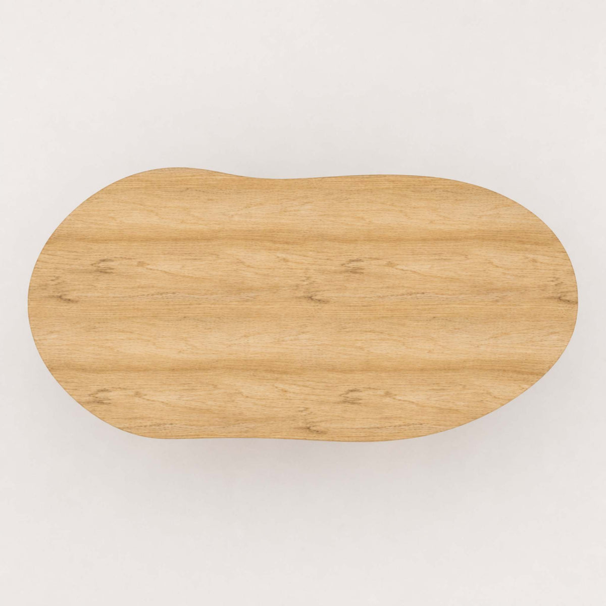Top view of the tabletop of the ÉTAUDORÉ & Our Wabi Sabi Home Agata organic shape table in solid oak wood