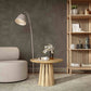 Interior arrangement with the Round Rigi Coffee Table in solid oak wood with a beautiful base