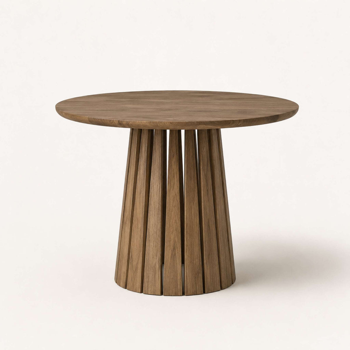 Round Rigi table from ÉTAUDORÉ in solid oak wood with a beautiful base in a smoky finish